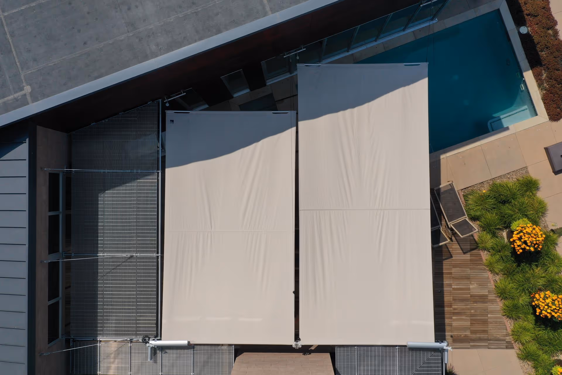 A drone shot shows the sails from above – you can see the larger, fully opened AX-I systems.