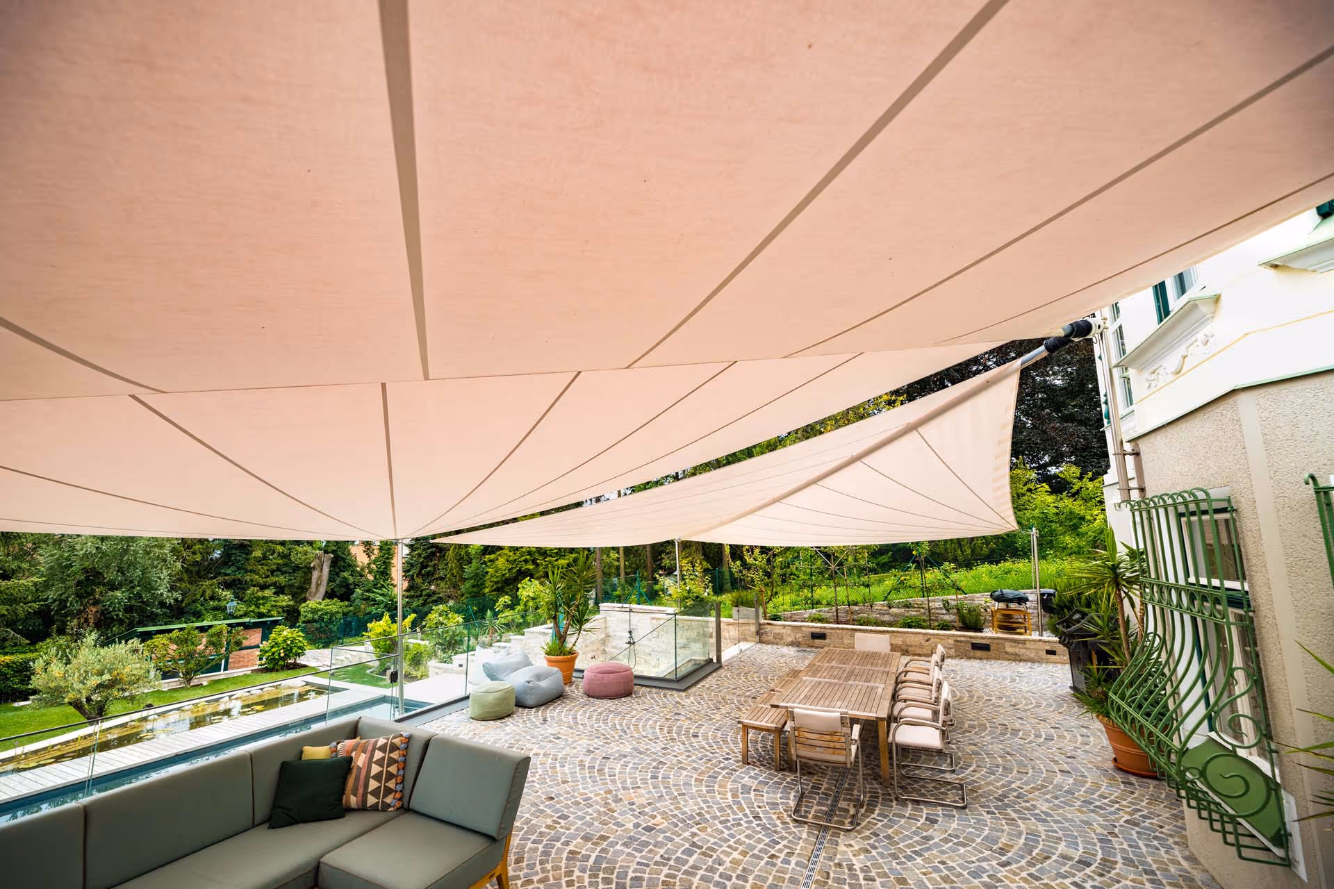 A pleasant, protective atmosphere is created under the sails.