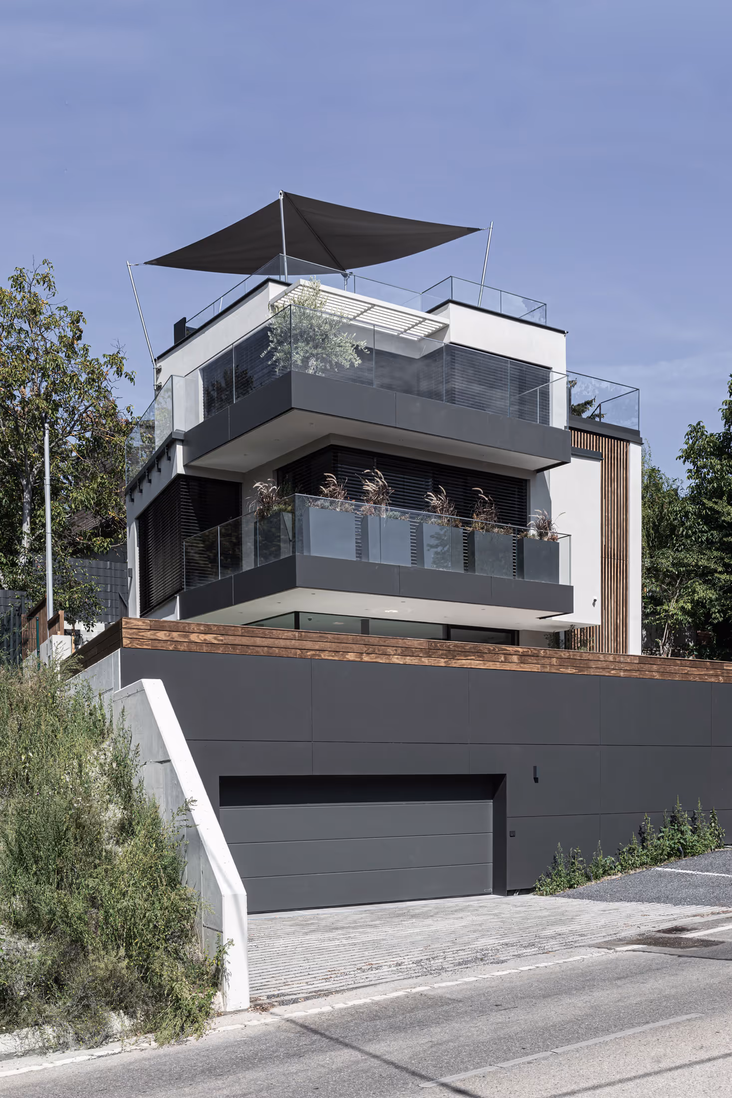 The sail opened, photographed from the road.