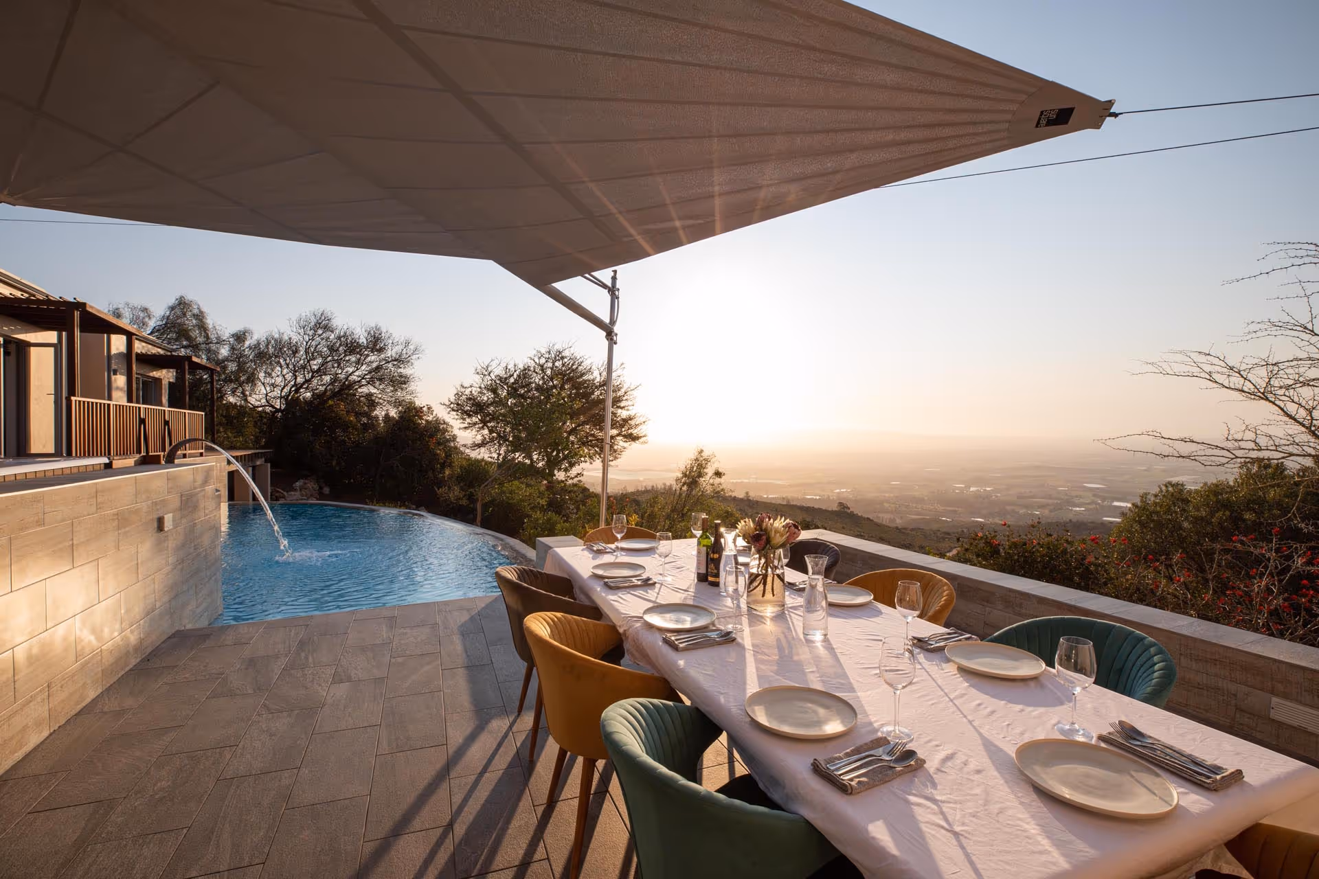 SunSquare shade on a terrace with pool in South Africa.