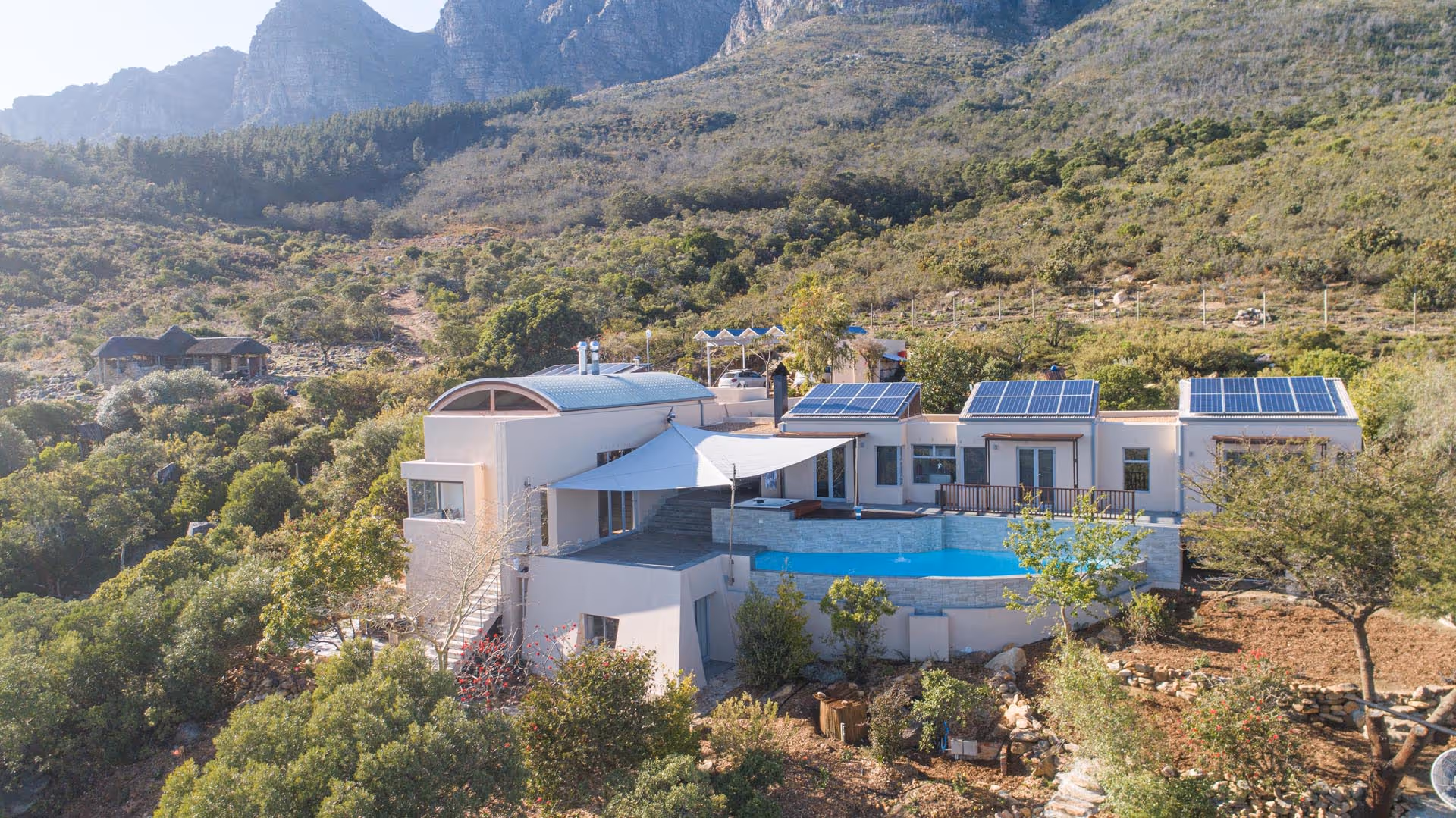 The farm in Cape Town from a distance. You can see the SunSquare sail.