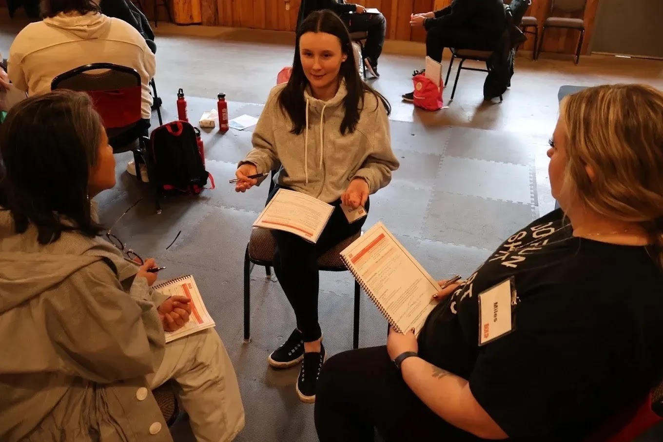 Leader empowering a team member in a supportive office environment, highlighting employee engagement