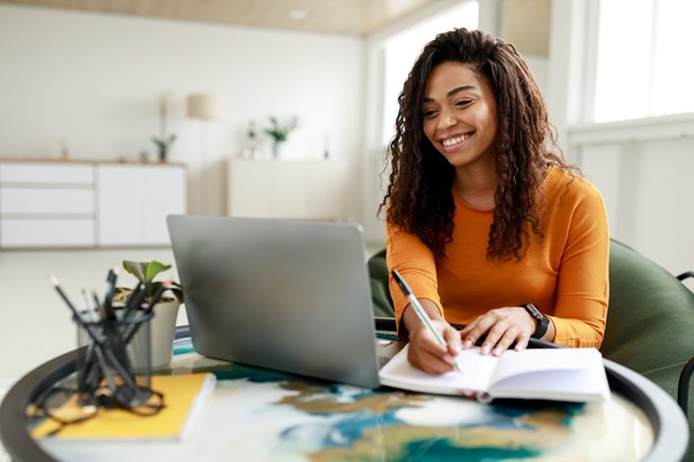 photo of a girl learning on laptop