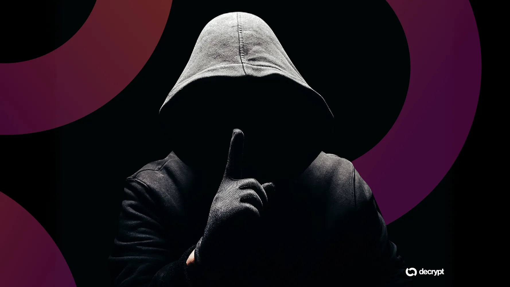 Hooded figure with finger to lips, suggesting secrecy or encryption
