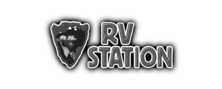 Shield emblem with stylized mountains and trees next to the words ‘RV Station’ in bold font.
