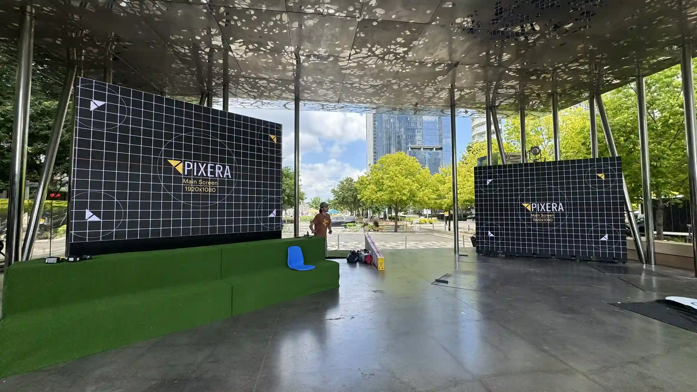 Two LED displays showing the words pixera on them