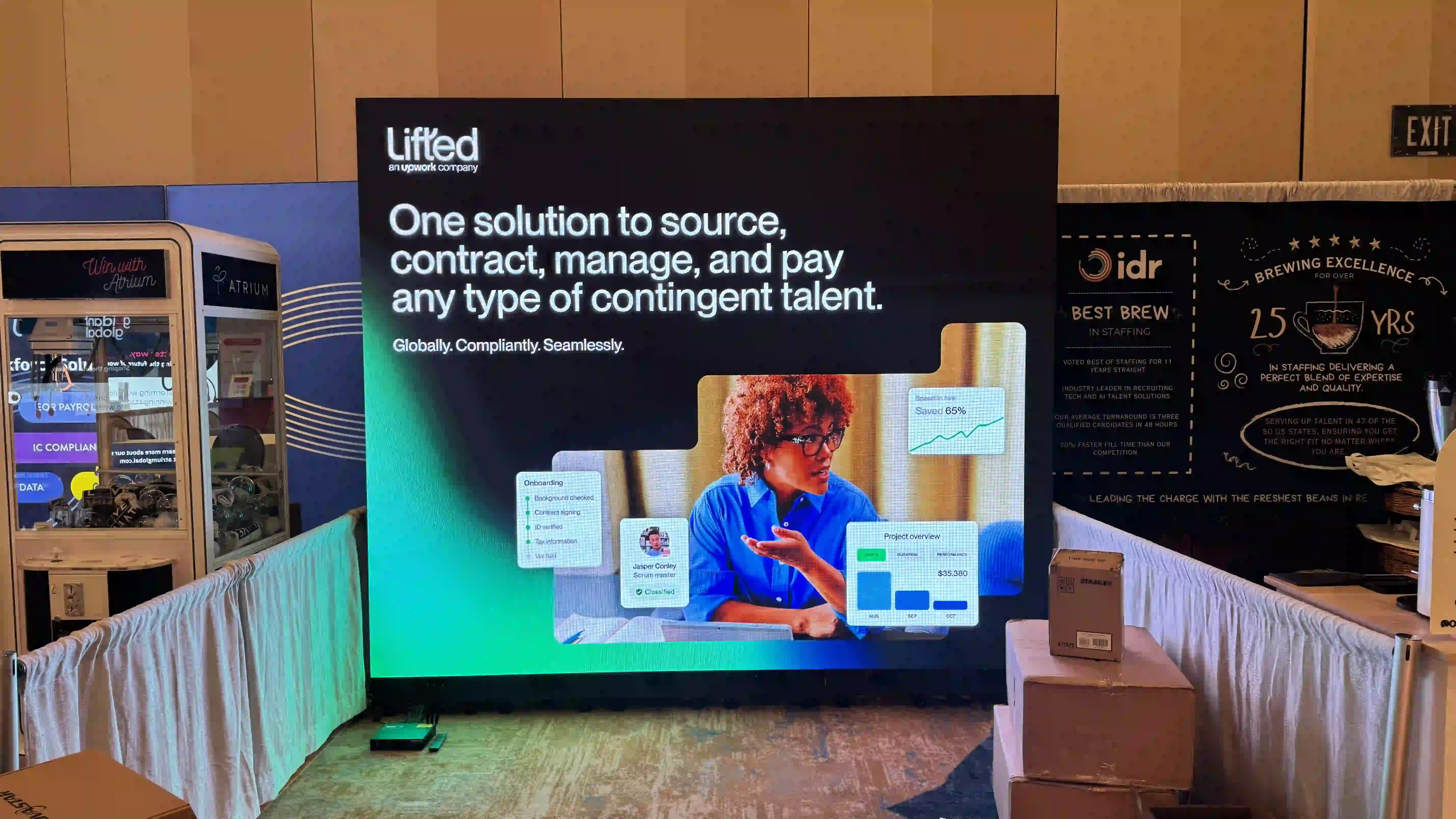 Trade show booth with seamless indoor LED video wall showing Lifted recruiting platform message and graphics inside the Omni Hotel in Dallas, Texas.