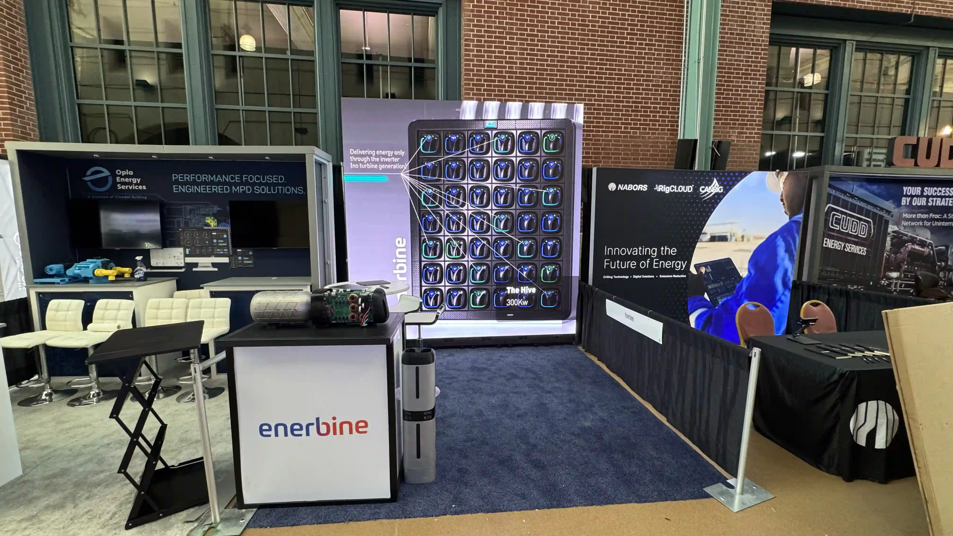 Tradeshow booth for Enerbine with a 10x10ft LED screen backdrop.