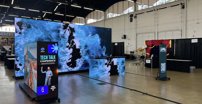 led panel showing blue visuals at trade show