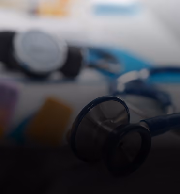 Close-up of a stethoscope on a desk, representing the healthcare industry