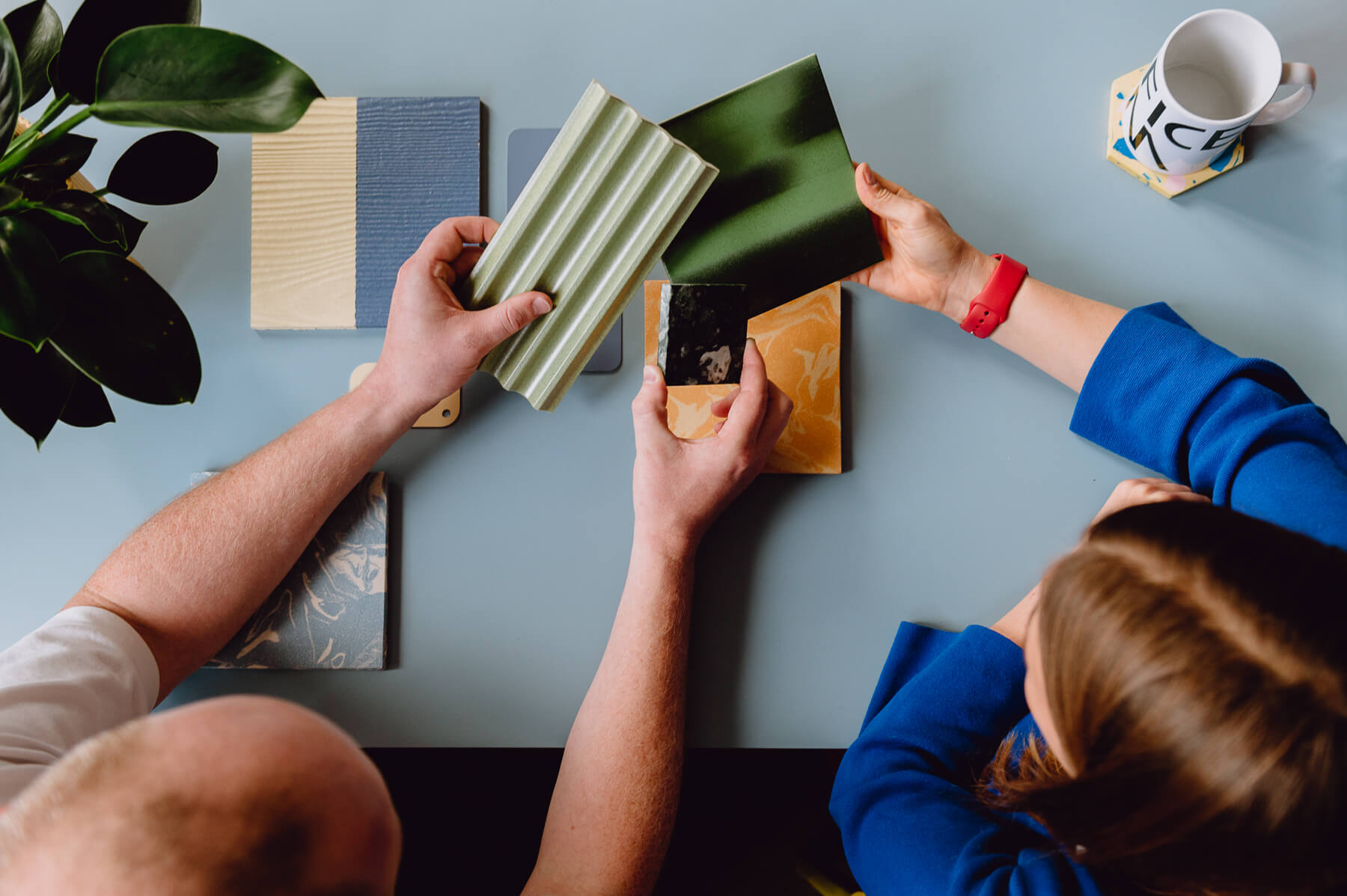 Photo of Hugh and Catrina, directors of Office S&M, choosing samples for a new project. By Office S&M, RIBA Chartered Architectural Practice in London.