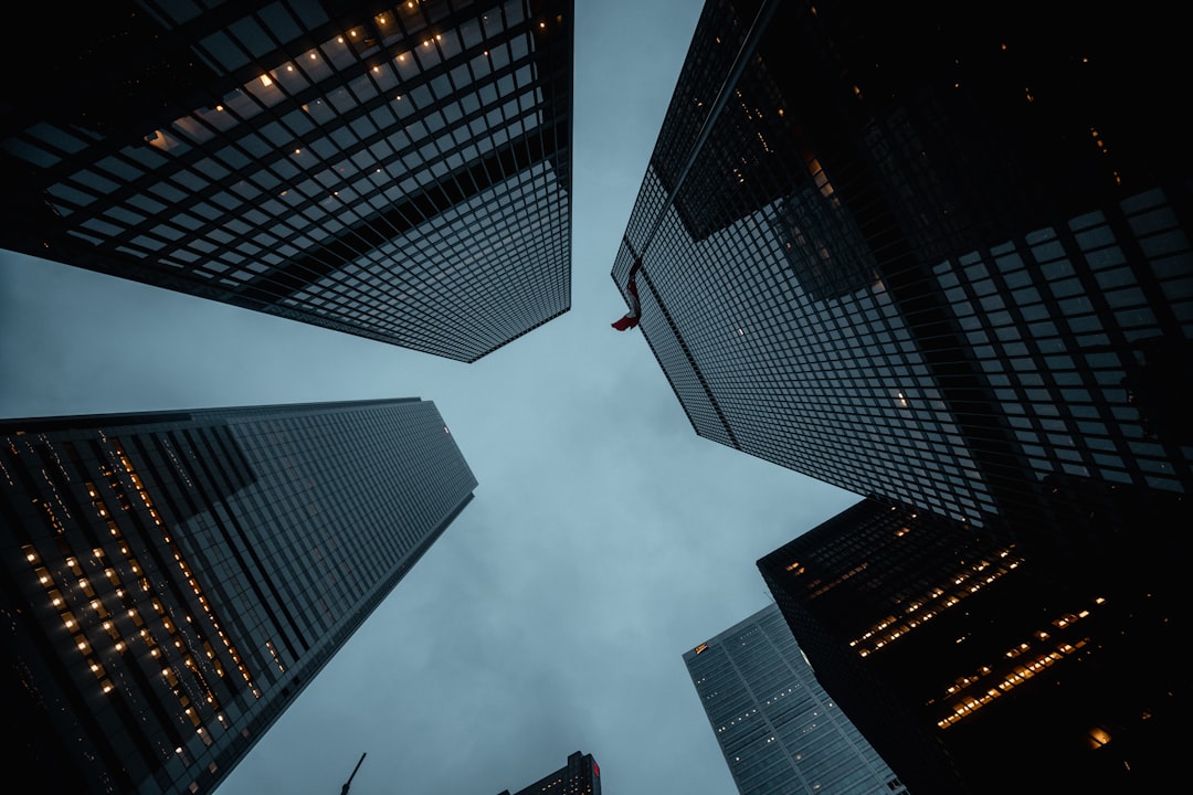 Looking up at skyscrapers