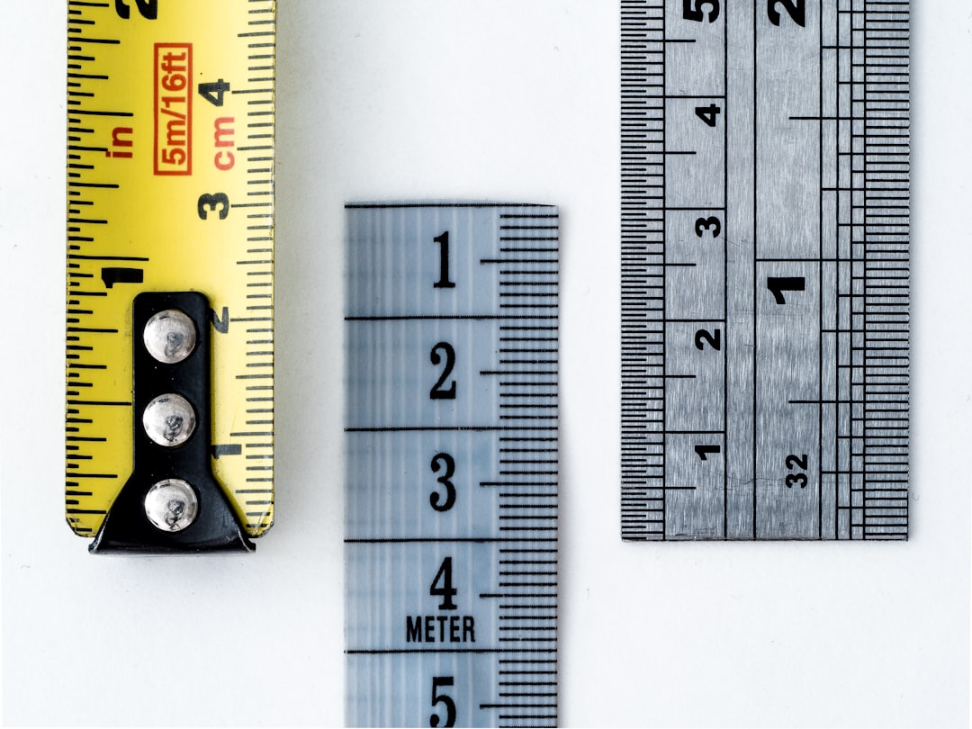 Measuring tape against a wall