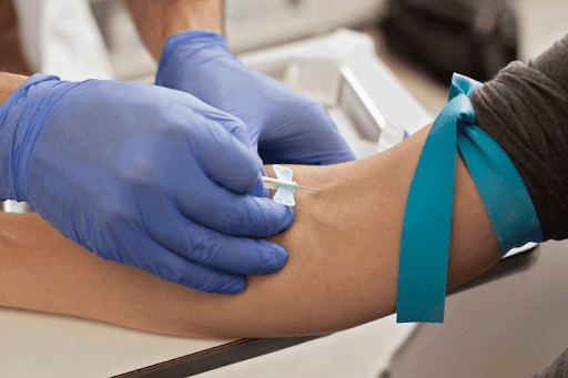 Doctor taking a blood test. 