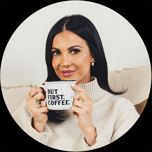 A lovely picture of Delaine drinking coffee.