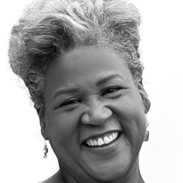 A woman with a smile on her face.