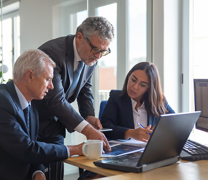 Meeting With Three People While Working On Laptop