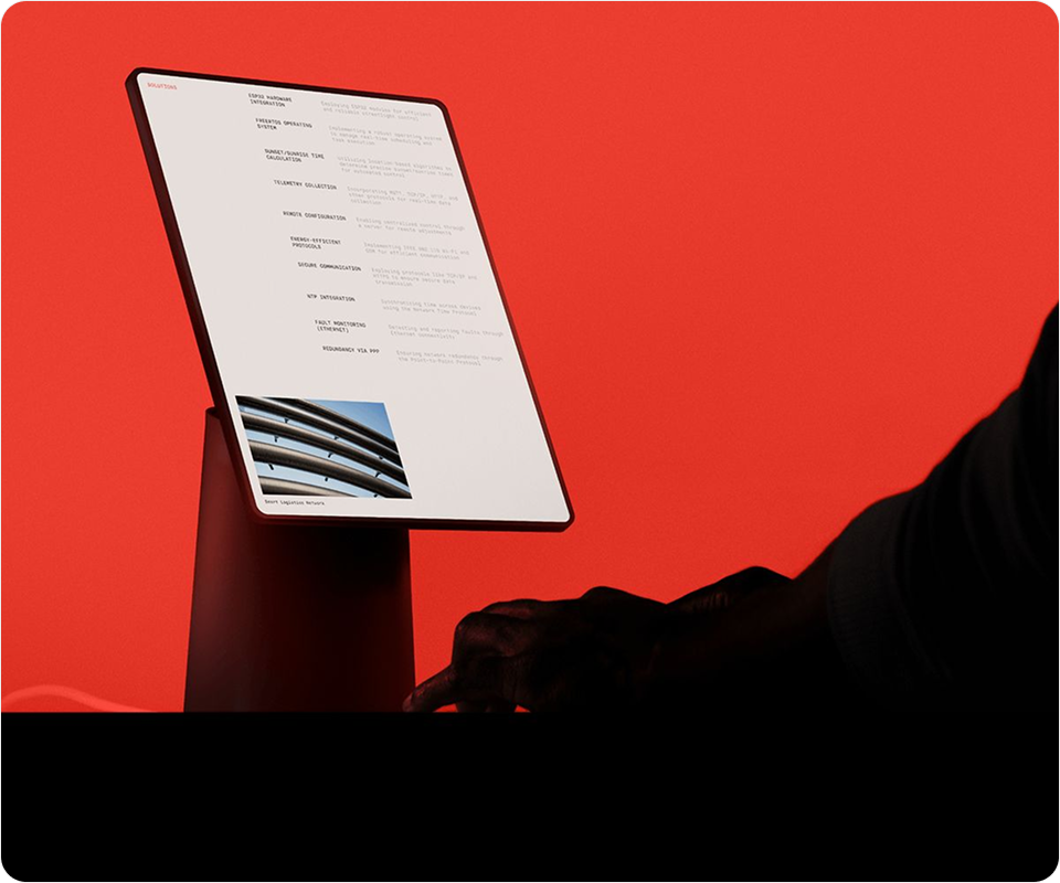 A silhouetted person holds a tablet displaying a document with text and an image of a building, set against a vivid red background.