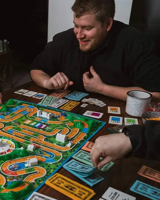 Friends playing a board game