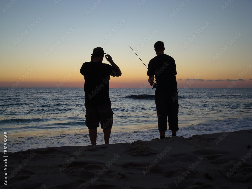 Two buddies fishing and bondign through that common interest