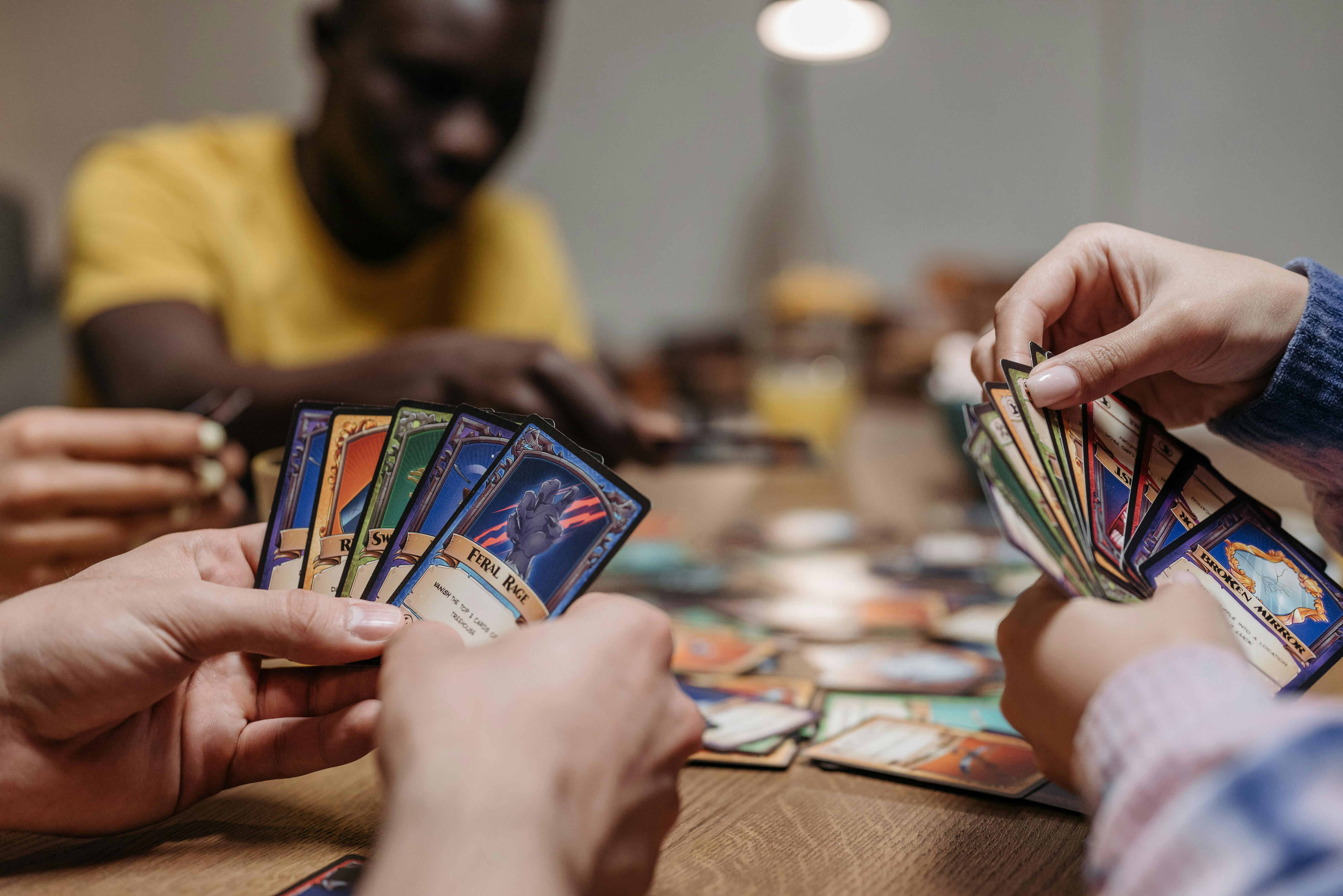 Social gathering with friends playing a card game indoors