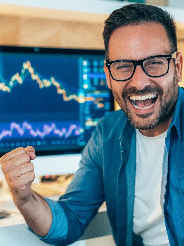 A trader celebrating