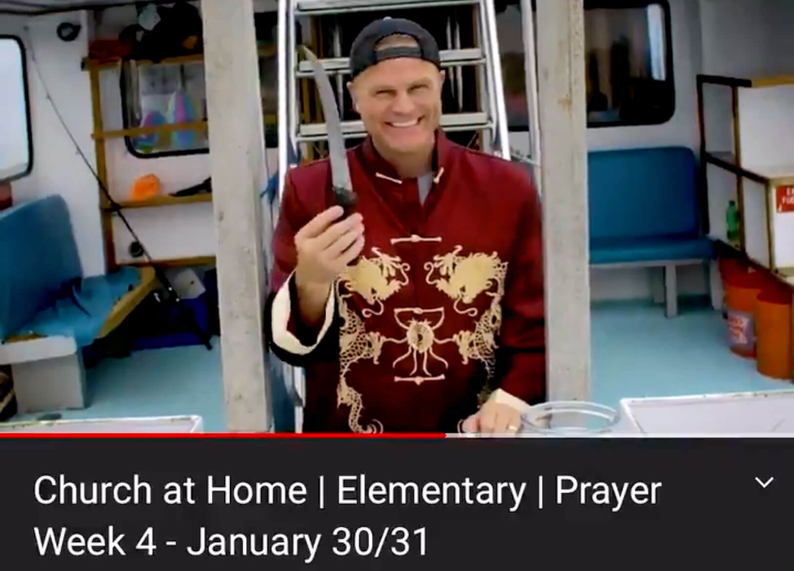 Saddleback pastor wearing generically East Asian clothes and making kung-fu fighting noises