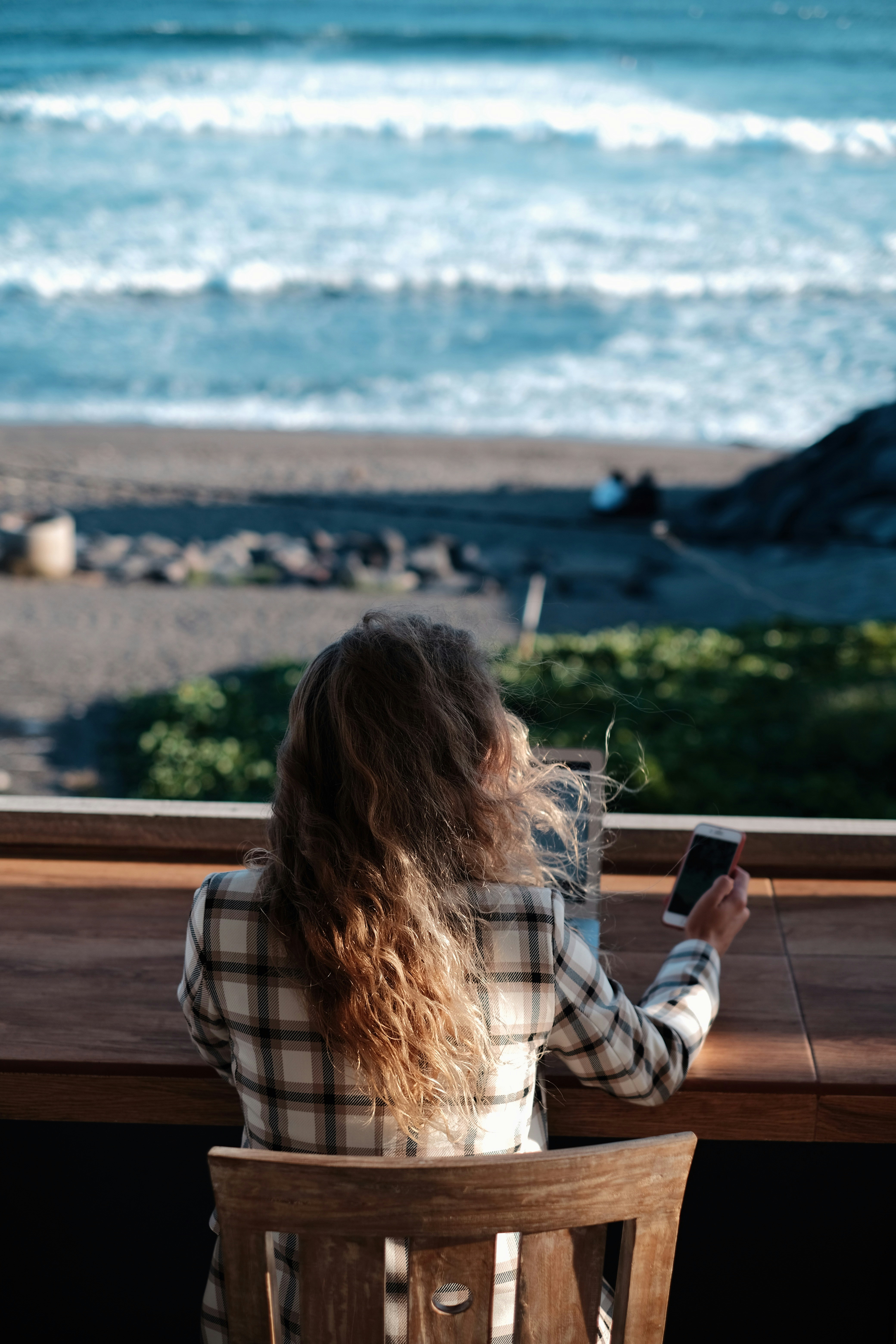 SEO Freelancer Working Remotely Next to a Beach