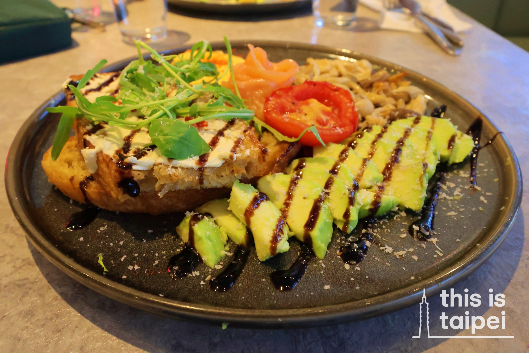 Avocado Salmon and Eggs Benedict from Muko Brunch in Daan District. (Photos by JT, July 2025 / © This Is Taipei) 