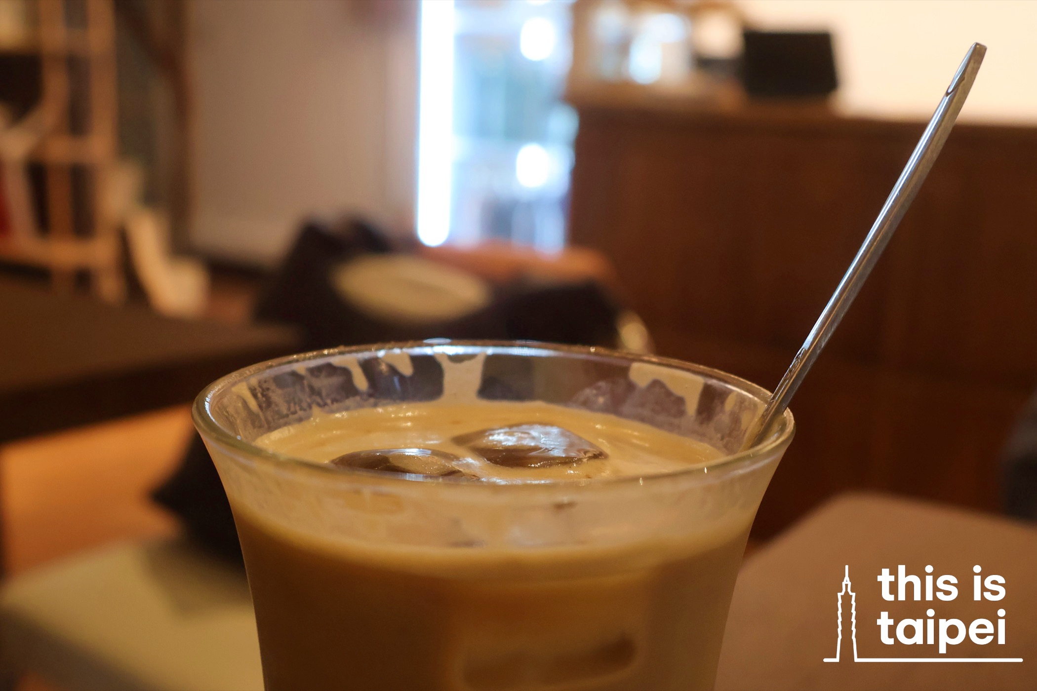 A slice of matcha cheesecake and a brown iced sugar latte from Koneko Vegan Coffee in Datong District. (Photos by KB, February 2026 / © This Is Taipei)