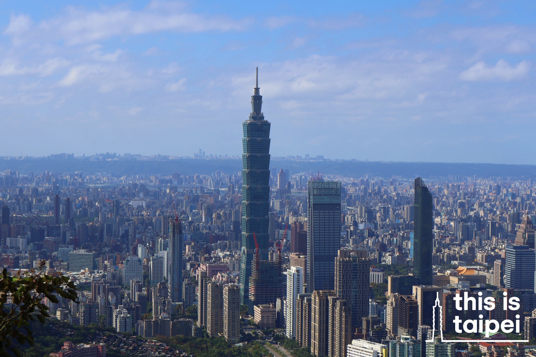 Taipei 101 and the city from the Nangang Mountain Range. (Photo by KB, January 2026 / © This Is Taipei)