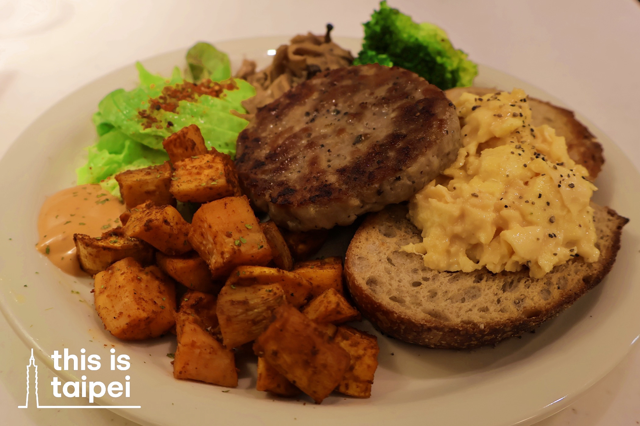 Steak n Eggs from Tamed Fox and hot pot at Haidilao  in Xinyi District. (Photos by KB, February 2026 / © This Is Taipei)