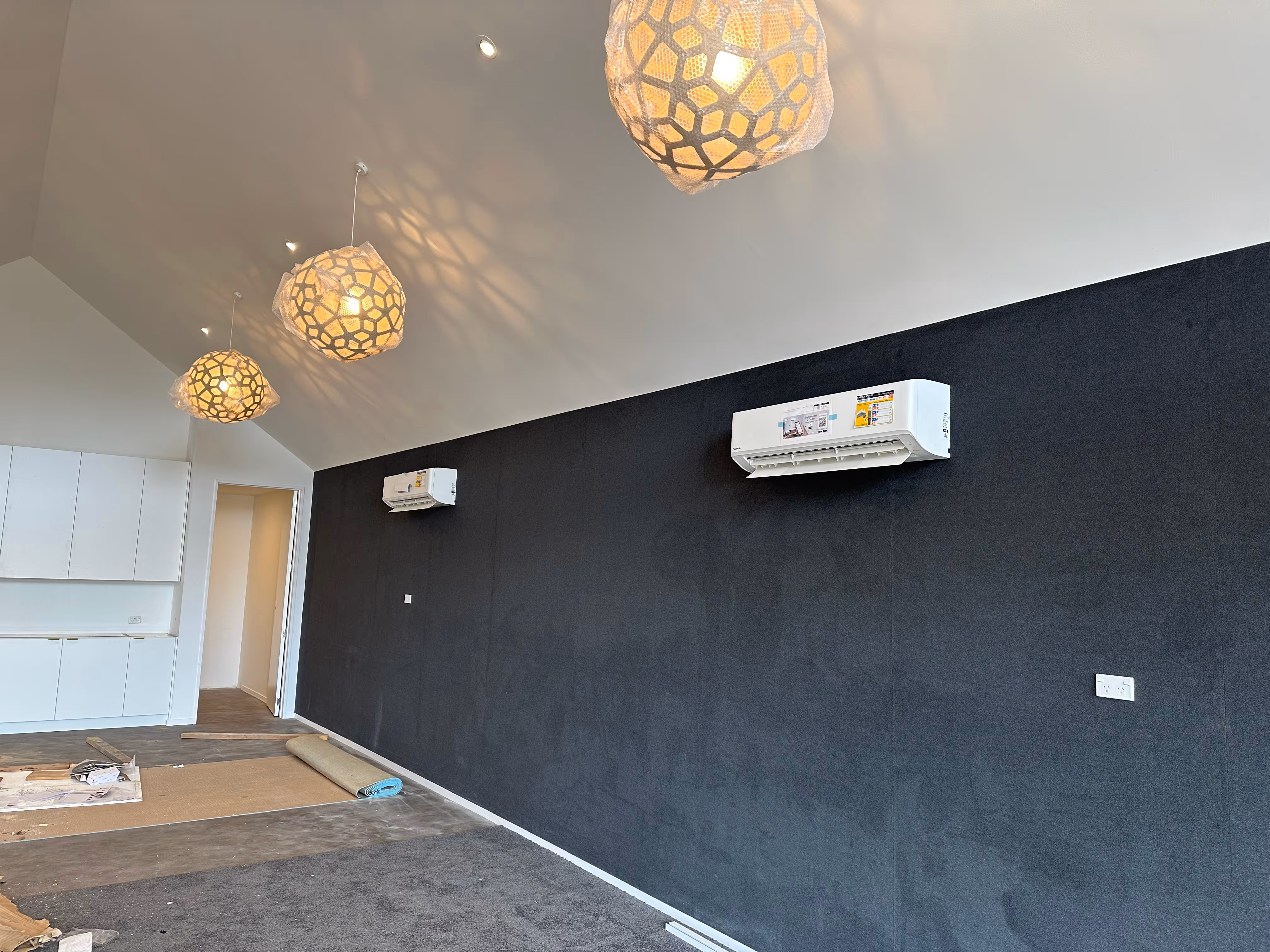 Wall-mounted heat pumps installed in a living area
