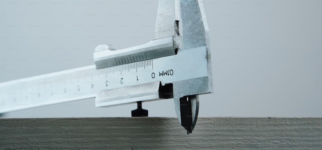 A precision caliper measuring a surface