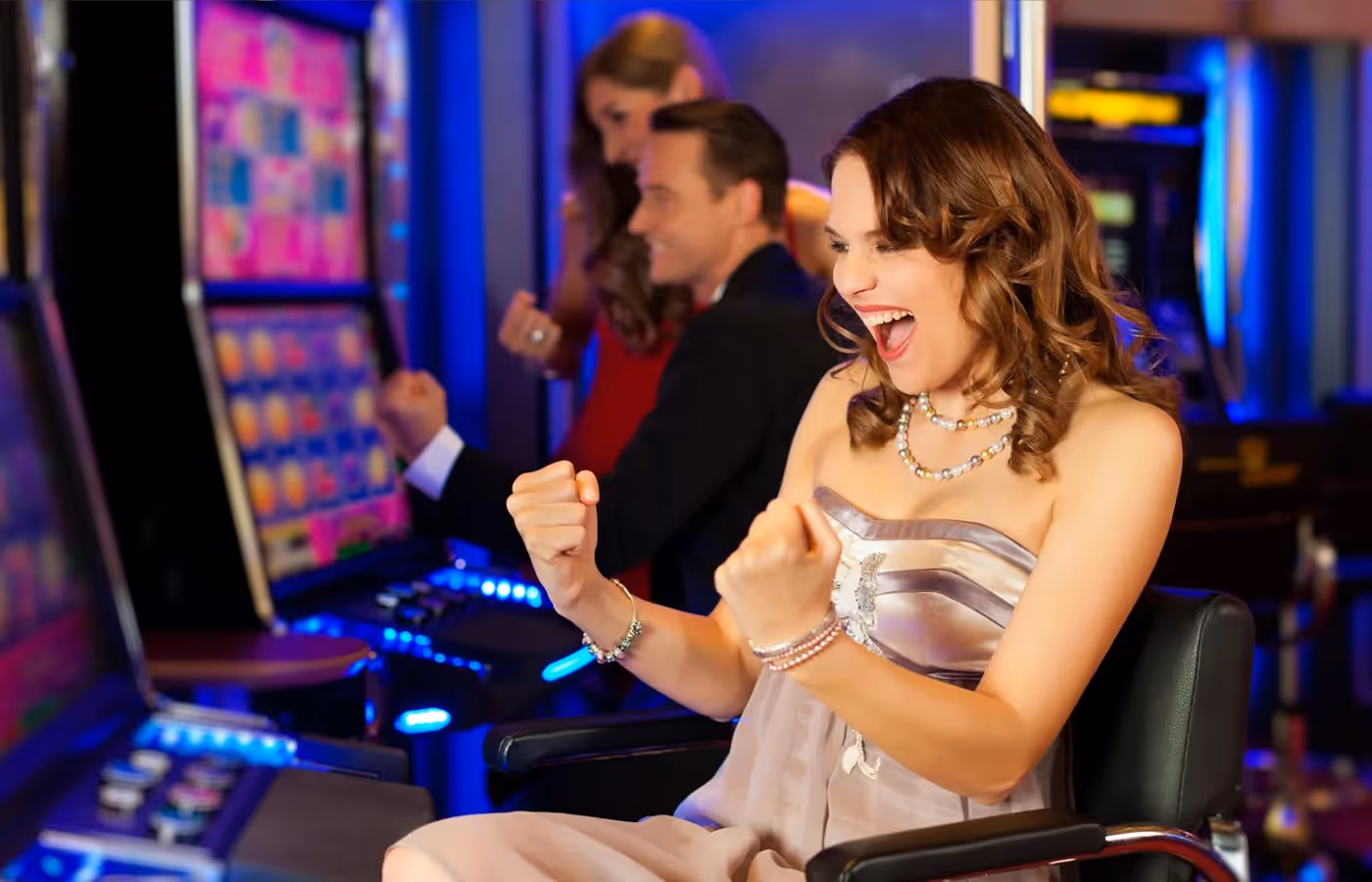 Casino welcome experience with players at slot machines