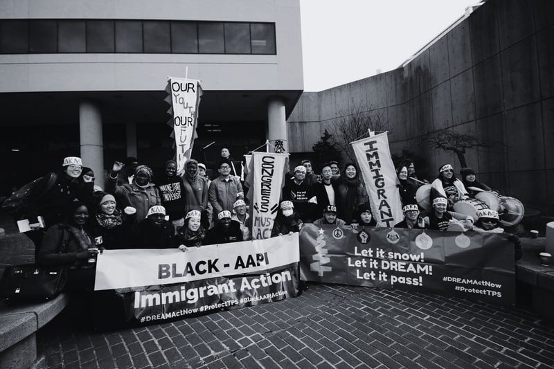 Diverse group of Black and Asian immigrant activists at the first Woori Ujima convening