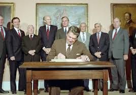 President Ronald Reagan signing the Immigration Reform and Control Act