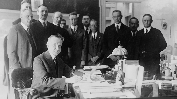 Image: President Calvin Coolidge signing the Johnson-Reed Immigration Act of 1924 (Library of Congress)