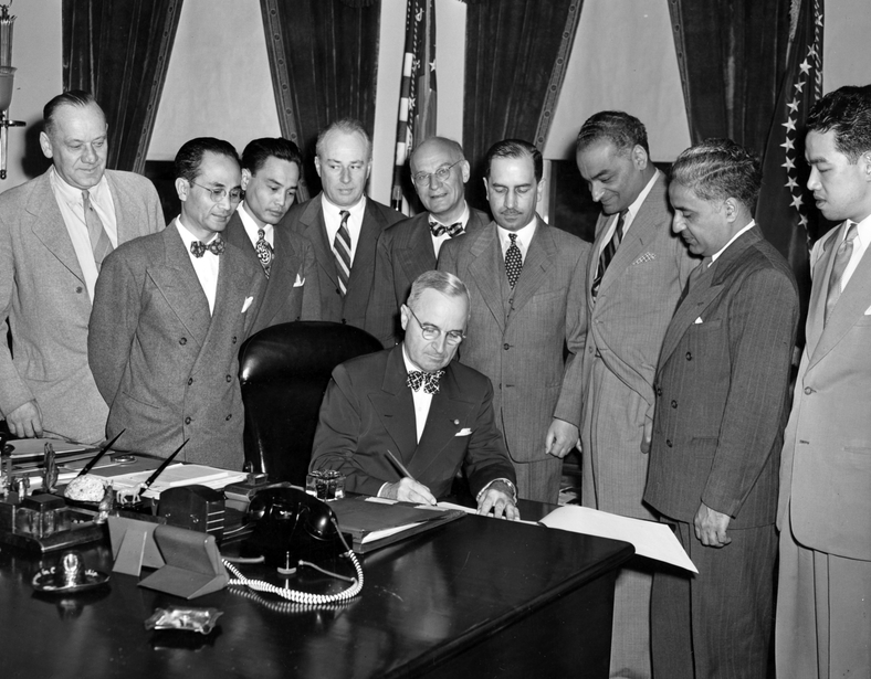 Image: US President Harry Truman signing into law the Luce–Celler Act in 1946 (Truman Library)