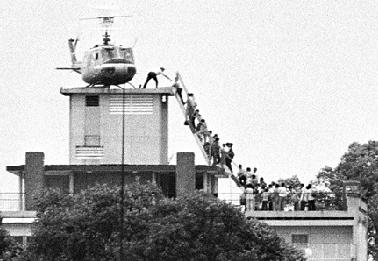 Helicopters evacuating people from rooftops during the Fall of Saigon