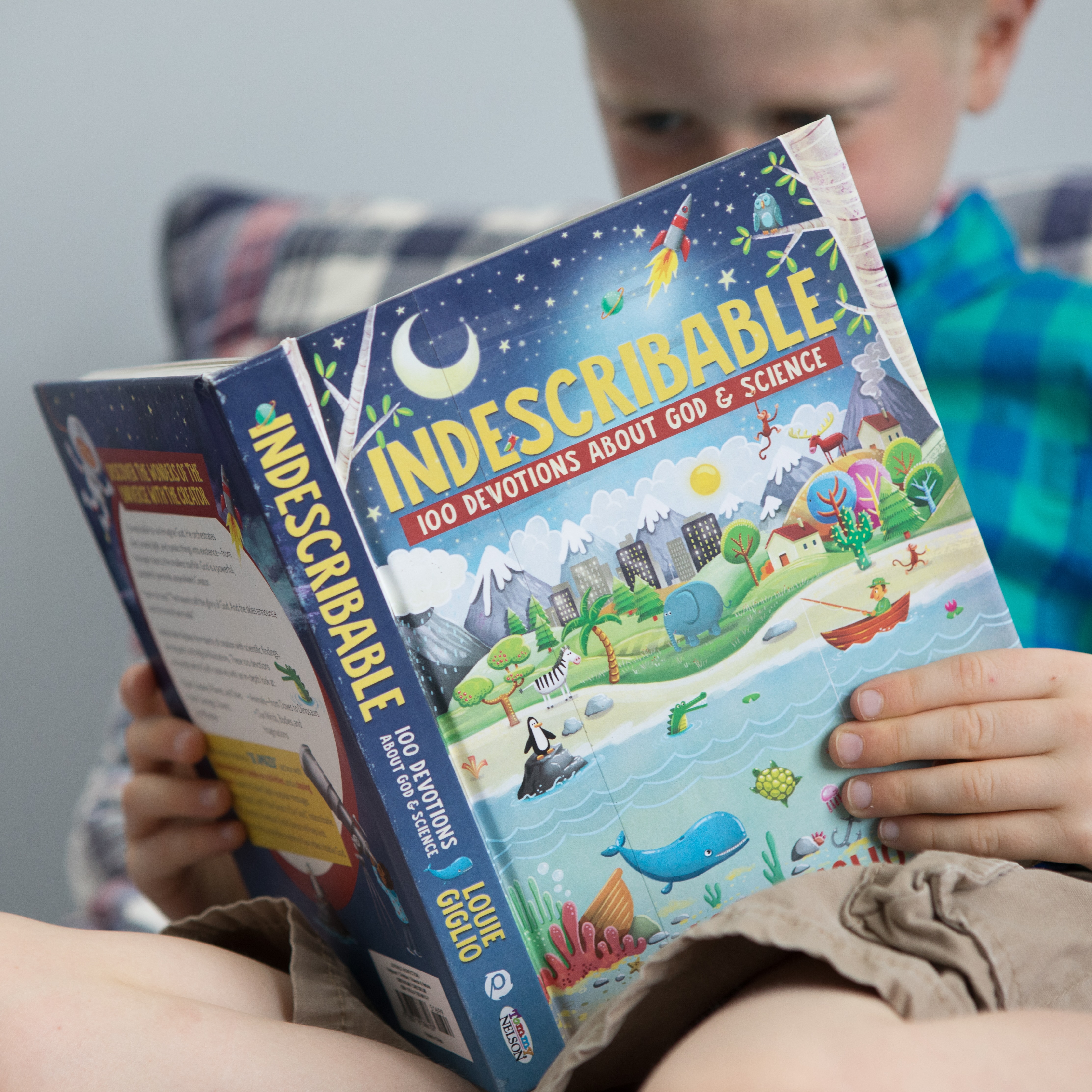 Boy reading Indescribable