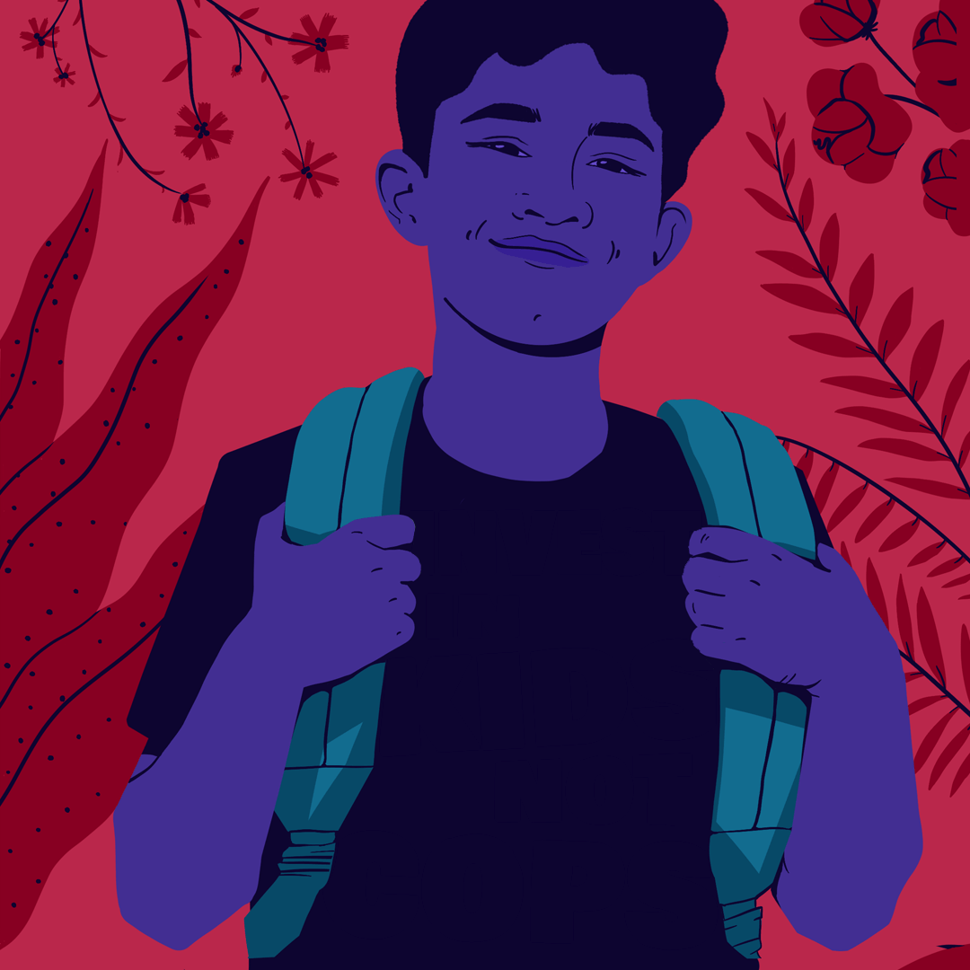 A student is wearing a backpack and smiling. 