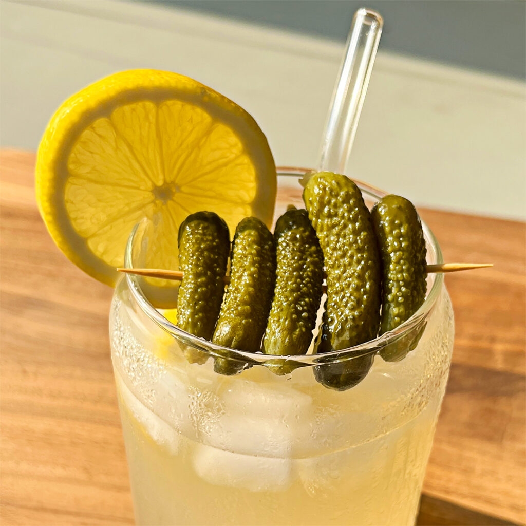 Pickle brine is the surprise star of fall cocktails—adding tang, salt, and depth to classics and tropical blends alike. From light spritzes to bold martinis and frozen tiki riffs, these drinks prove brine is more than a garnish—it’s a flavor upgrade. Jeff Kretschmar reviews, pairs, and taste-tests the trend straight from D&W Fresh Market.