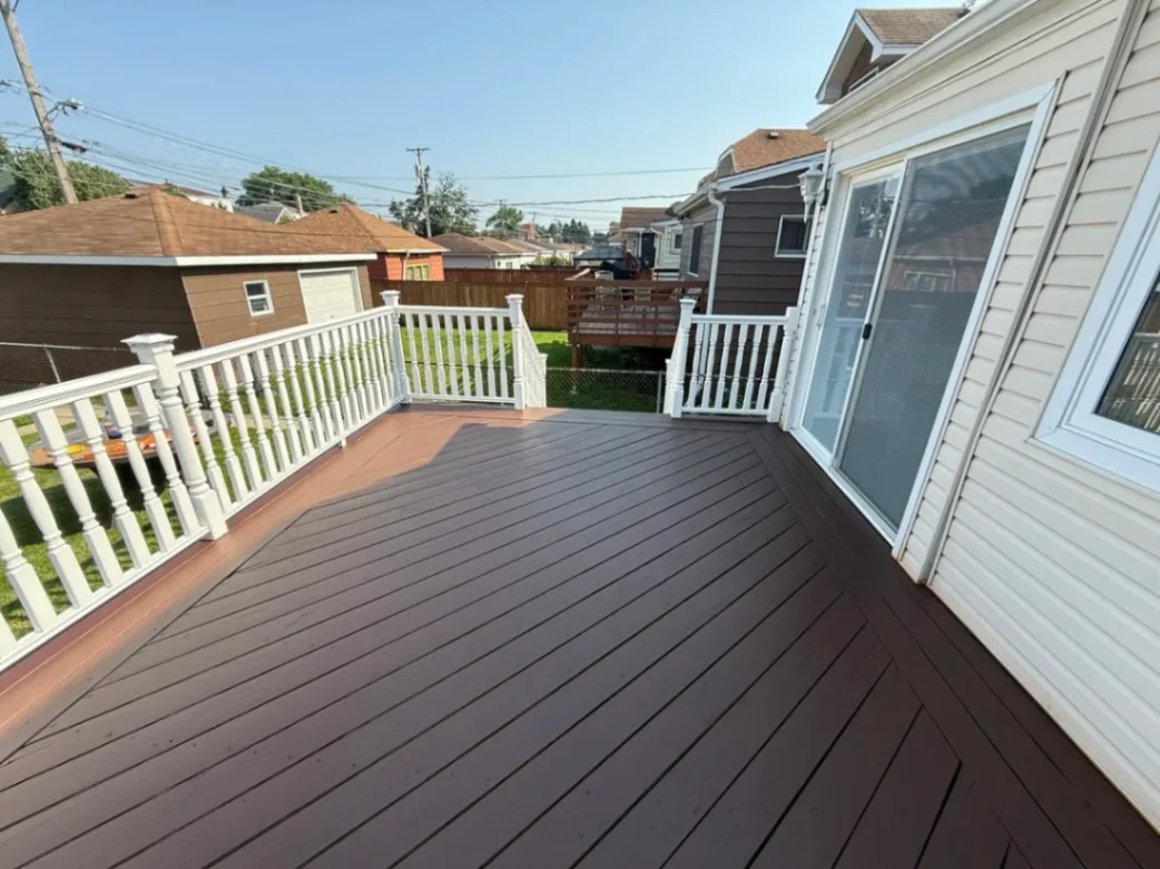 Licensed handyman fixing damaged deck boards and stairs in Chicago suburbs