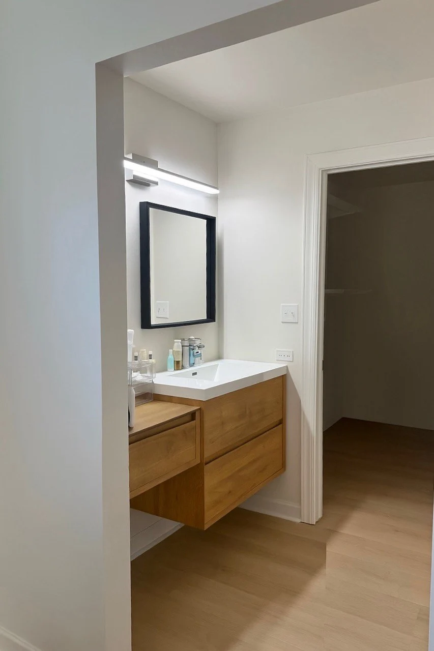Professional vanity installation with double sink and storage cabinets in Naperville | TMV Services