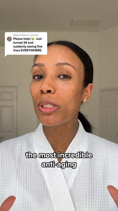 Video ad: a creator in a bathrobe answering a comment about fine lines, captioned the most incredible anti-aging