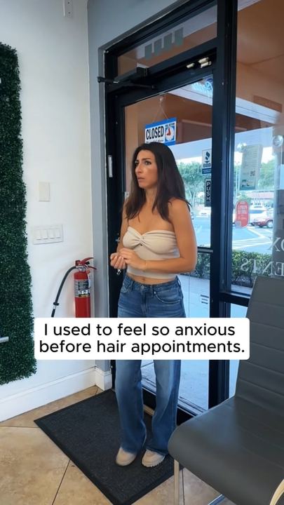 Video ad: a woman walking into a hair salon, captioned I used to feel so anxious before hair appointments
