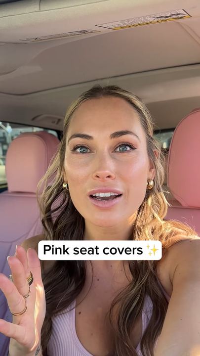 Video ad: a creator sitting in a car showing pink seat covers