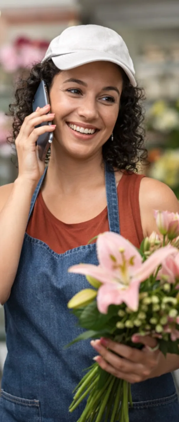 Self-employed florist taking a call