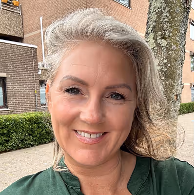 woman in green shirt